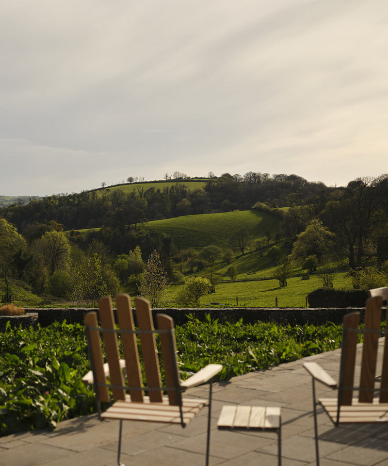 Featuring the Grythyttan Stalmobler A3 Sunlounger looking over the Devon countryside