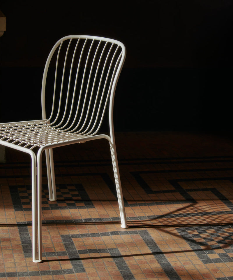 The Thorvald dining chair on a mozaic floor within the museum 
