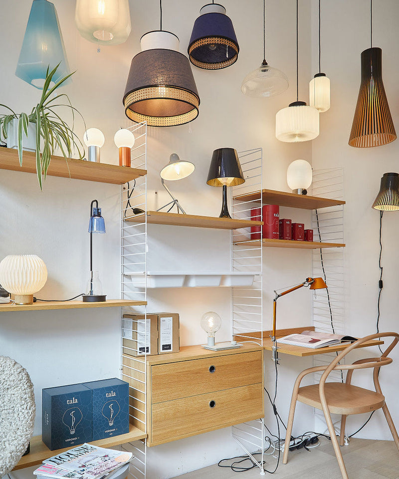 Image from our showroom showing a range of lighting and furniture on display