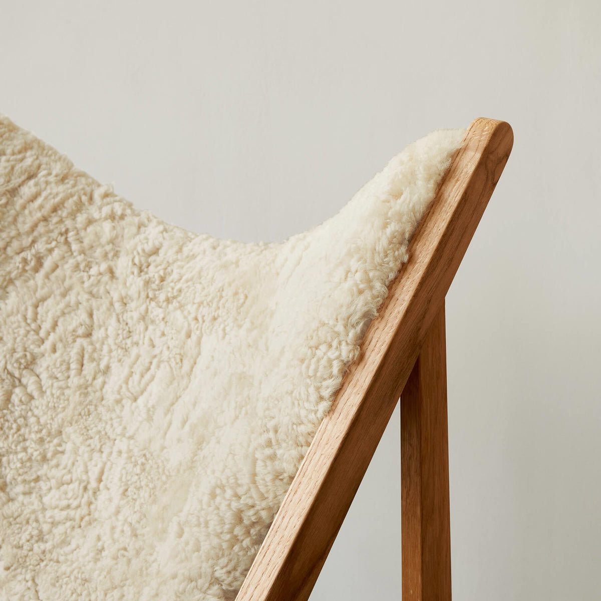 Audo Copenhagen Knitting Lounge Chair Sheepskin Edition