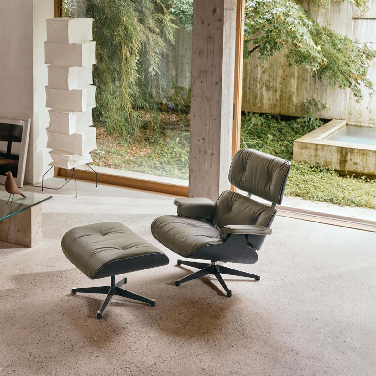 Vitra Eames Contemporary Lounge Chair and Footstool in Black Chestnut