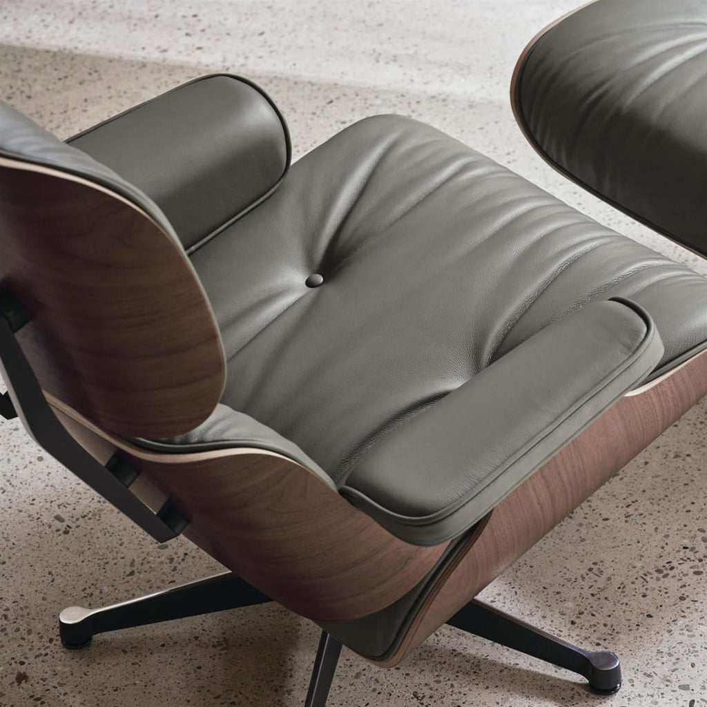 Vitra Eames Contemporary Lounge Chair and Footstool in Natural Walnut