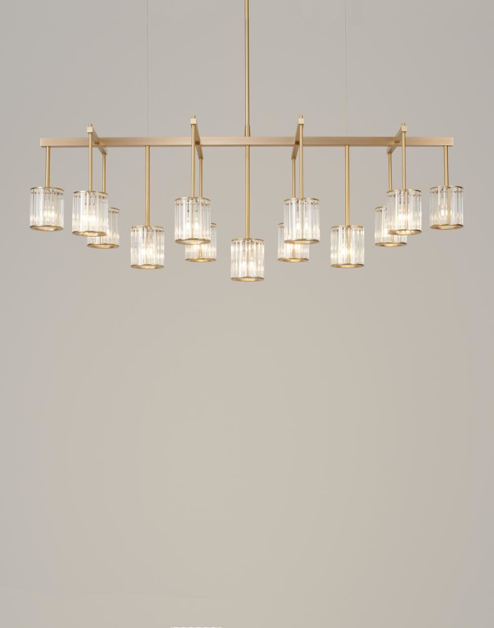 Tom Kirk Lighting Flute Beam Chandelier in Brushed Brass