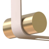 Beige frame with brass cylinder