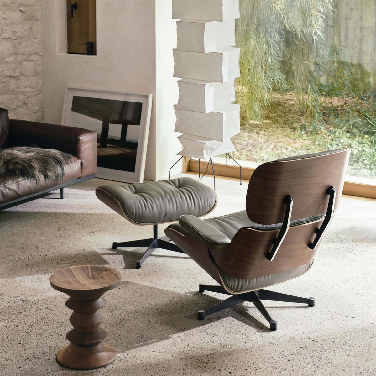 Vitra Eames Contemporary Lounge Chair and Footstool in Dark Walnut