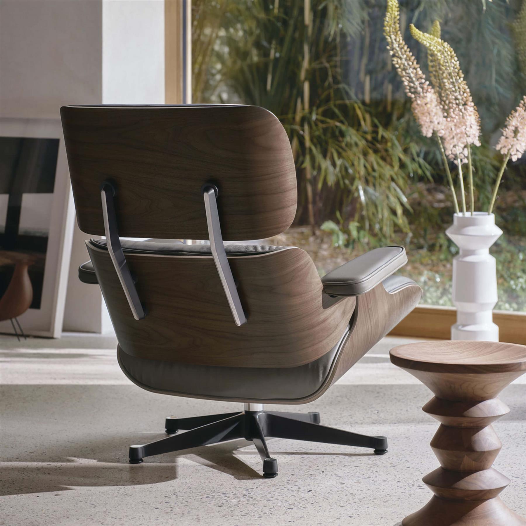 Vitra Eames Contemporary Lounge Chair and Footstool in Dark Walnut