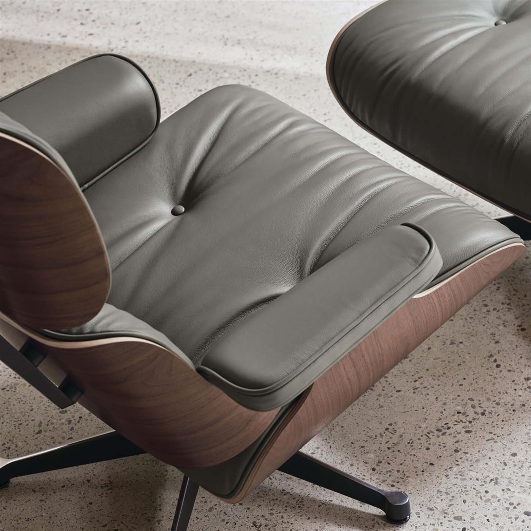 Vitra Eames Contemporary Lounge Chair and Footstool in Dark Walnut
